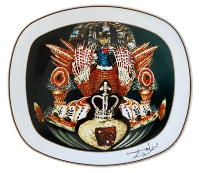 a plate with a picture of a pheasant and a crown on it
