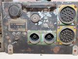 an old radio sitting on top of a table