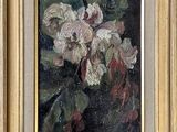 painting of white flowers in a gold frame on a black background