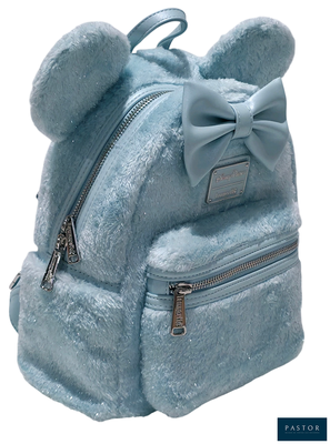 un petit sac à dos bleu orné d'un nœud