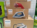 several boxes of different types of appliances are stacked on top of each other