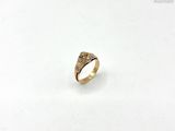 an image of a gold ring with diamonds on it
