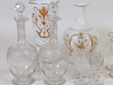 a lot of glass vases that are sitting on a table