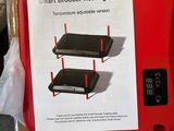 une boîte surmontée d'une plaque chauffante rouge