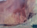 a close up of a painting of a shoe on a table