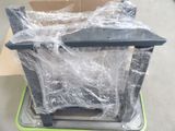 a box with plastic wrap on it sitting on a table