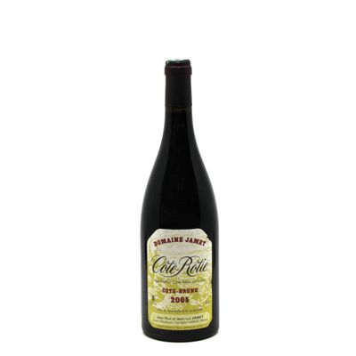 a bottle of red wine sitting on top of a white table