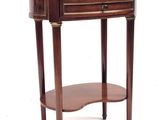 an image of a small table with a drawer on it