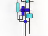 a sculpture of a blue and green geometric design