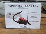 a box on a table with a vacuum on it