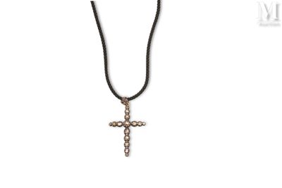 a black cord necklace with a cross pendant on it