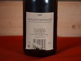 a bottle of wine that is sitting on a table