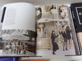a book with a picture of a fashion show on it