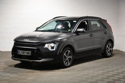 a picture of a grey suv parked in a garage