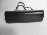 black leather case for a camera on a white surface