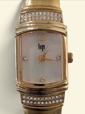 an image of a close up of a wrist watch with diamonds on it