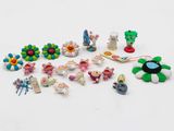 a lot of toys that are sitting on a white surface