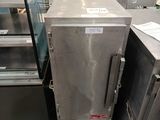 several stainless steel refrigerators and freezers in a warehouse
