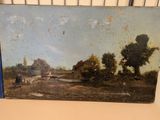 a picture of a painting on a shelf in a room