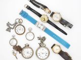 many different types of watches on a white surface