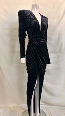 an image of a black dress on a mannequin base