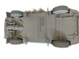 a model of a vehicle that is on display on a white surface