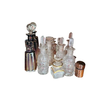 a lot of glass bottles that are sitting on a table