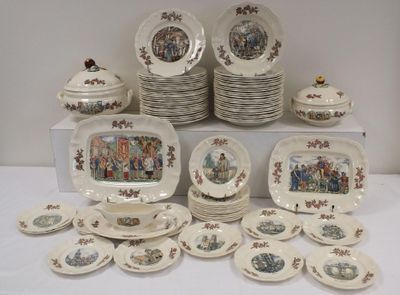 a lot of plates and bowls on the table