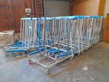 many carts that are lined up in a warehouse