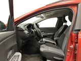 the interior of a car with the door open and the driver ' s seat down