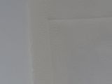 a piece of paper that has been folded up on top of it