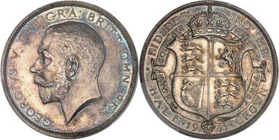 a close up of a coin with a man ' s face on it