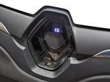 a close up of a car ' s dashboard with a clock on it