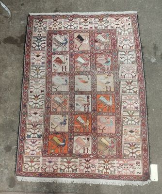 an old rug with many different designs on it