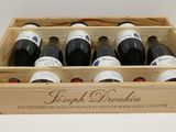 six bouteilles de vin dans un coffret en bois
