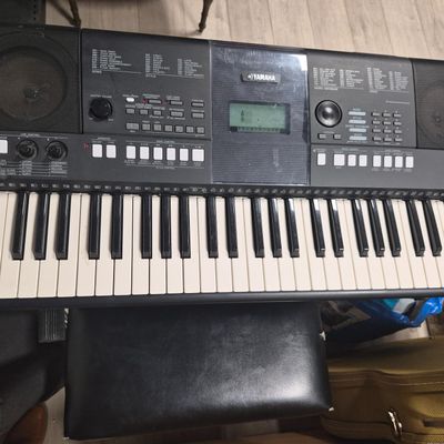 a keyboard that is sitting on top of a table