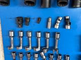 a lot of tools that are on a blue board