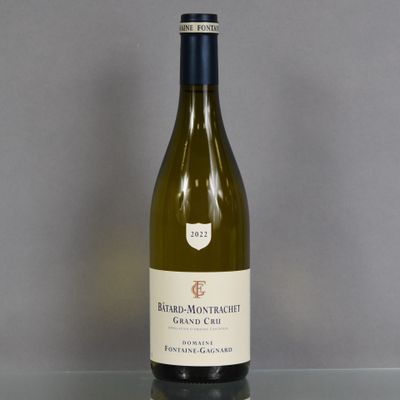a bottle of wine that is sitting on a table