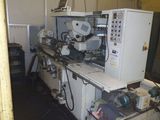 a machine that is sitting in a room next to a table