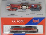 une boîte sur laquelle figure une maquette de train
