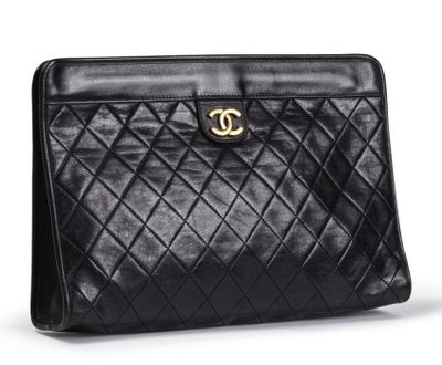 a chanel black quilted leather clutch bag