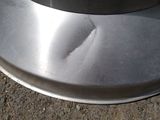 a close up of a metal object on the ground