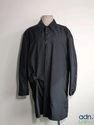 a close up of a black coat on a mannequin mannequin