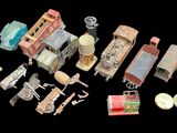 many different types of toy trains on a black background
