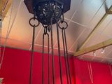 a chandelier hanging from the ceiling in a room