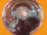 a picture of a glass object that is on a table