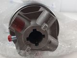 a metal object that is wrapped in plastic on a table