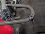 a close up of a red seat in a gym
