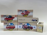 four boxed boxed boxed toys of a red fire truck and other vehicles