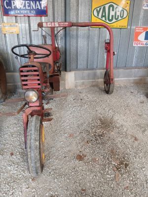 a red bicycle that is parked in front of a building
